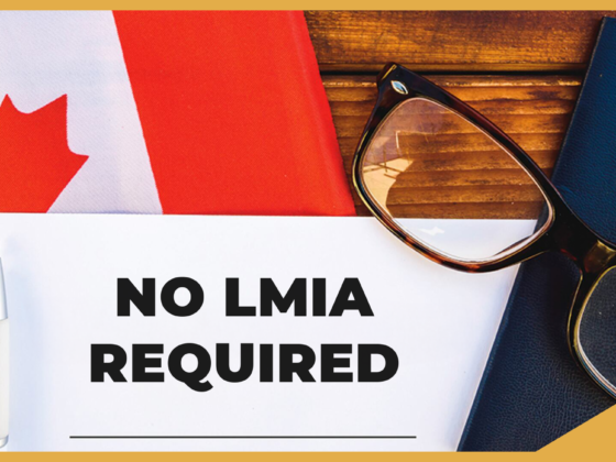 A close-up of a Canadian flag, a passport, and a pen on a wooden desk, with the words "No LMIA Required" written on a sheet of paper.